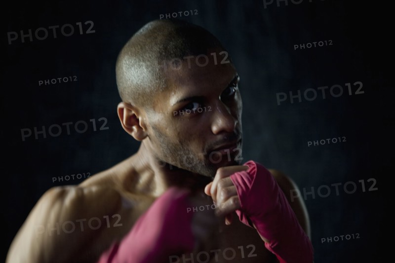 Hispanic boxer warming up