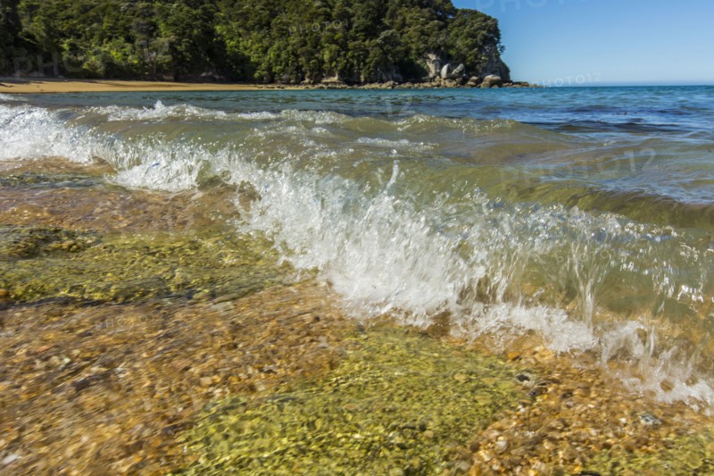Ocean waves crashing on remote beach