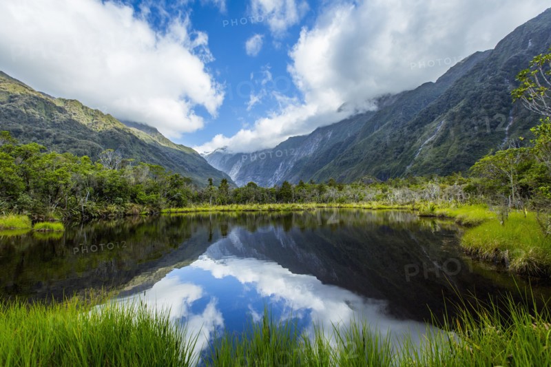 Mountains reflecting in remote lake