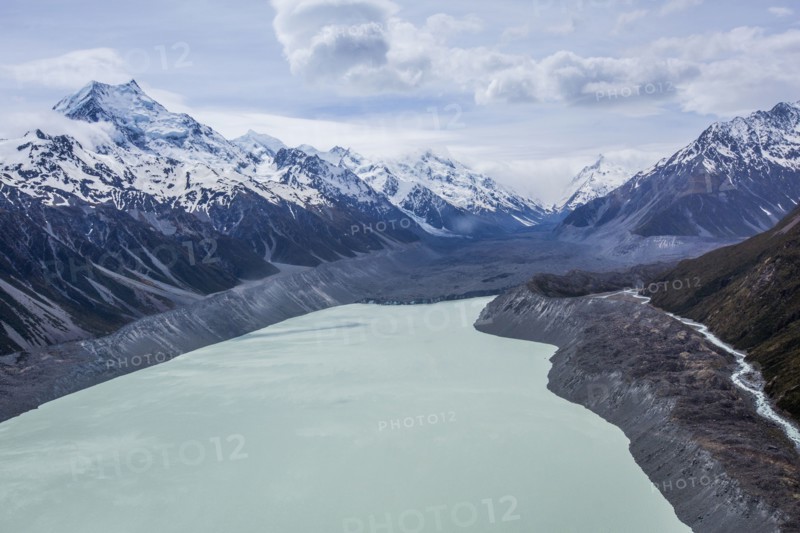 Remote mountains over frozen lake