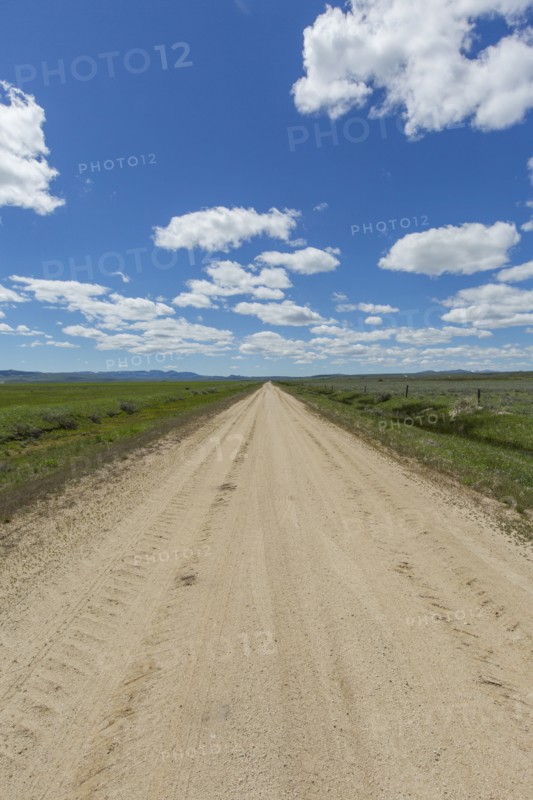 Dirt road toward mountains