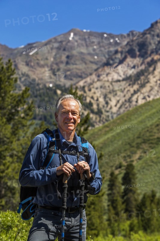 Caucasian man hiking in mountains