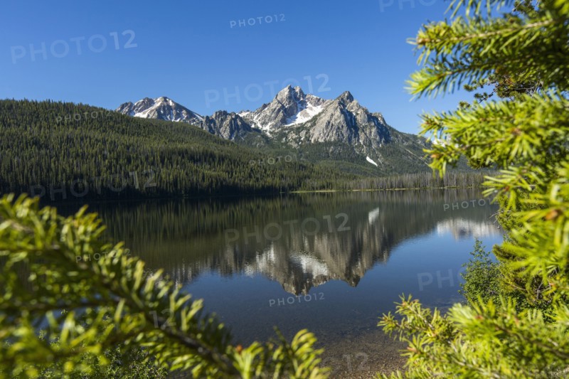 Reflection of mountain in still lake