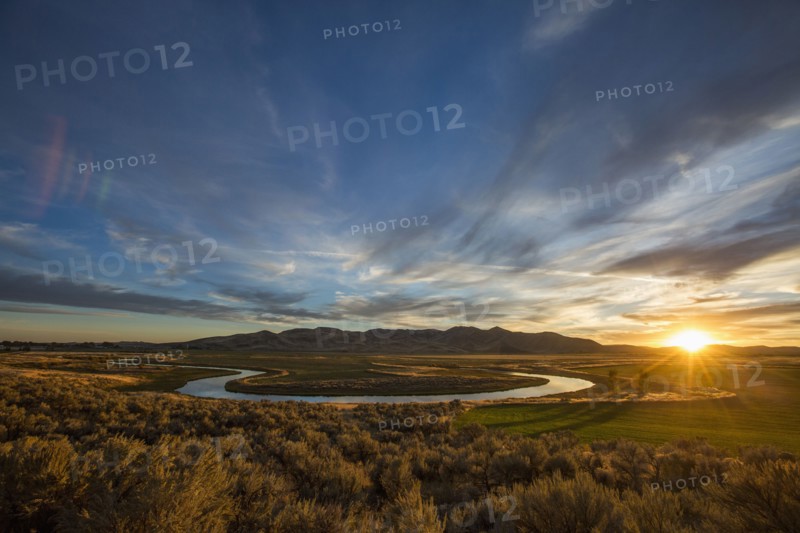 Sunset over winding river