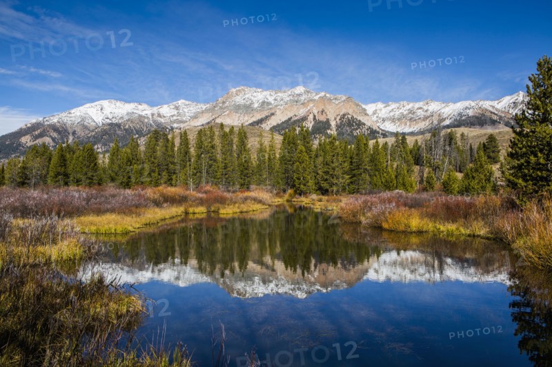Reflection of mountain in river
