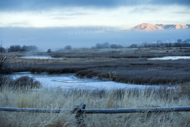 River in foggy mountain landscape