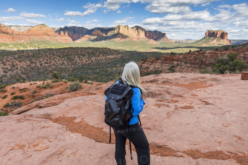 Caucasian woman hiking in desert landscape