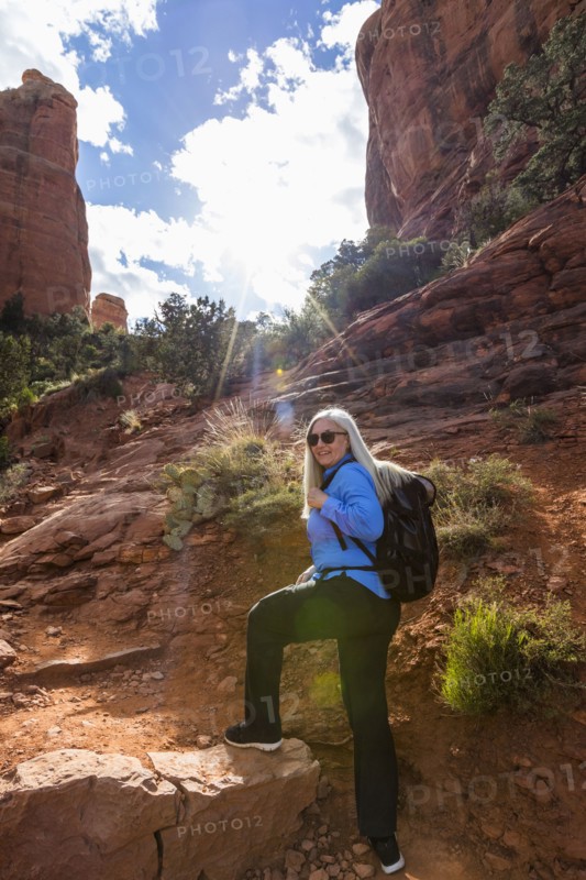 Caucasian woman hiking in desert landscape