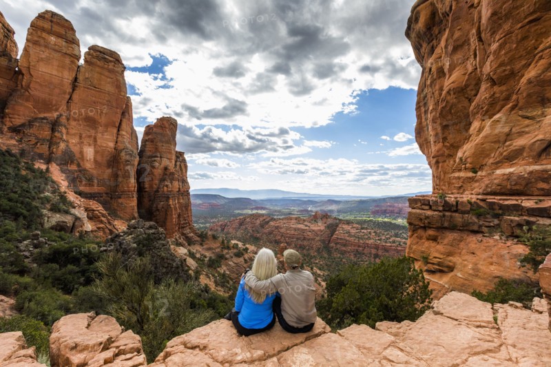 Caucasian couple admiring scenic view in desert landscape