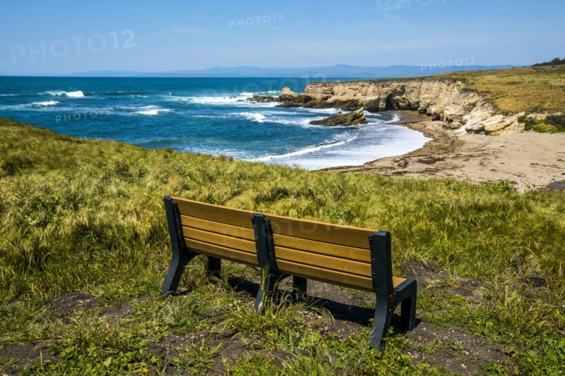 Bench overlooking ocean cove