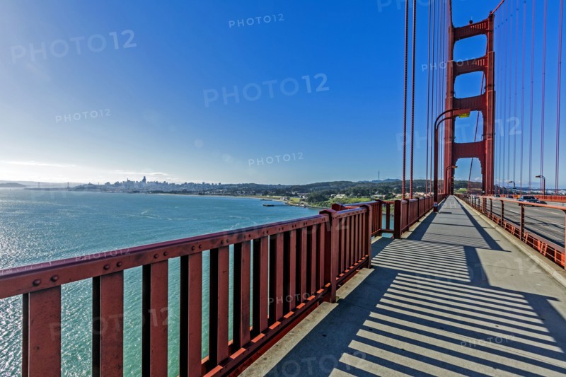Shadows on walkway of bridge