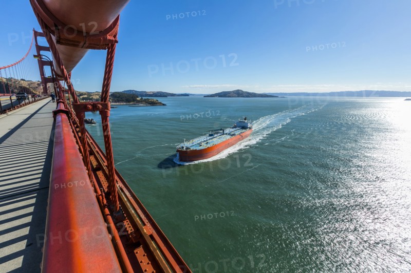 Bridge over boat in bay