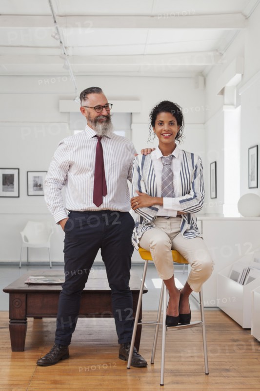 Portrait of a smiling businessman and businesswoman