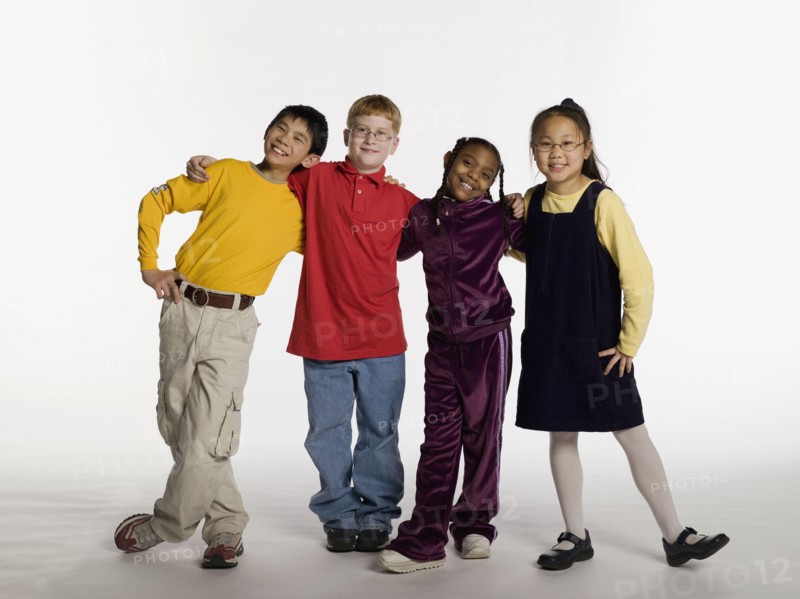 Multi-ethnic children hugging