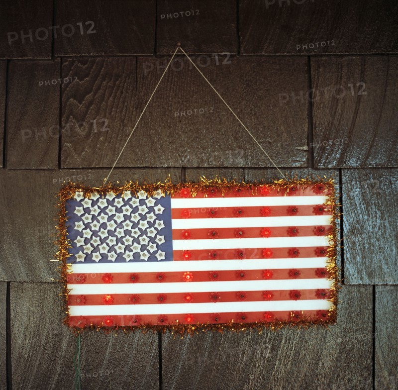 Handmade American flag hanging on wall