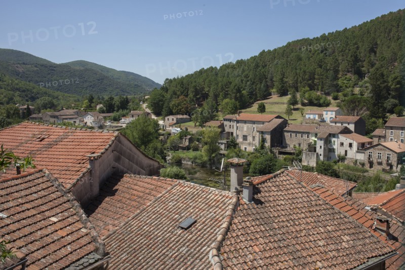 Aerial view of rooftops in rural village