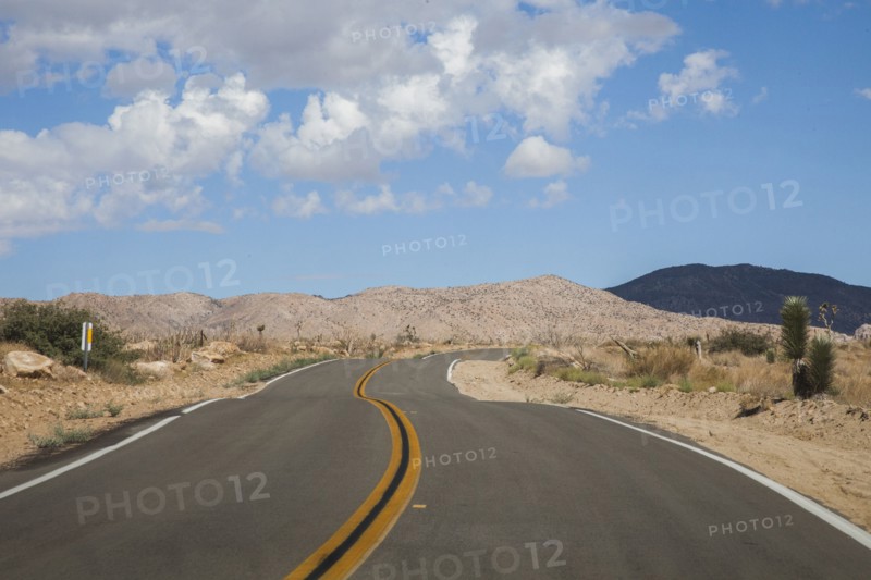 Empty road in rural desert landscape