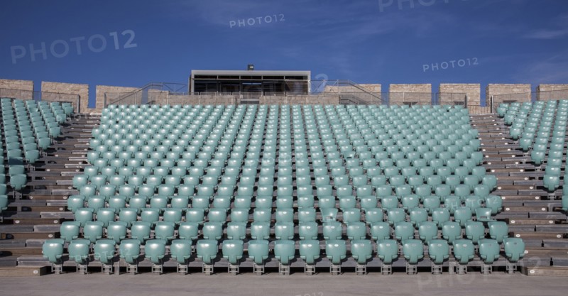Empty chairs in outdoor amphitheater