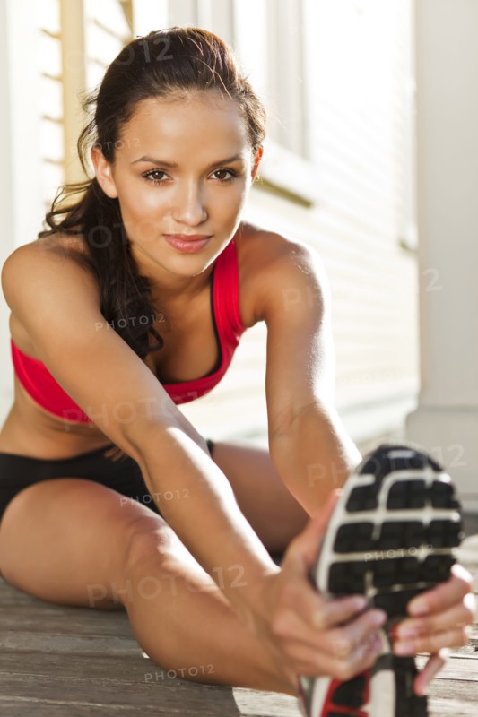 Woman warming up before exercise