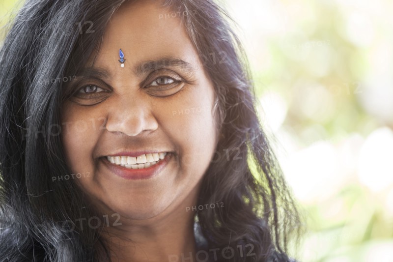 Indian woman with jewel on forehead