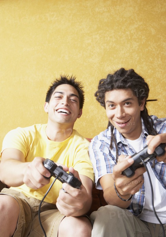 Two Hispanic men playing video games