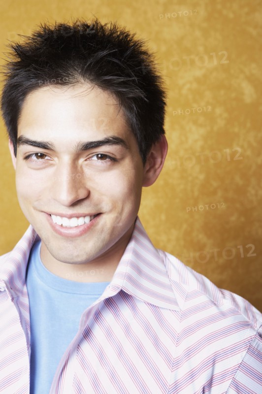 Close up of Hispanic man smiling