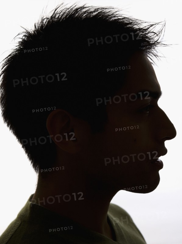Silhouette profile of Pacific Islander man