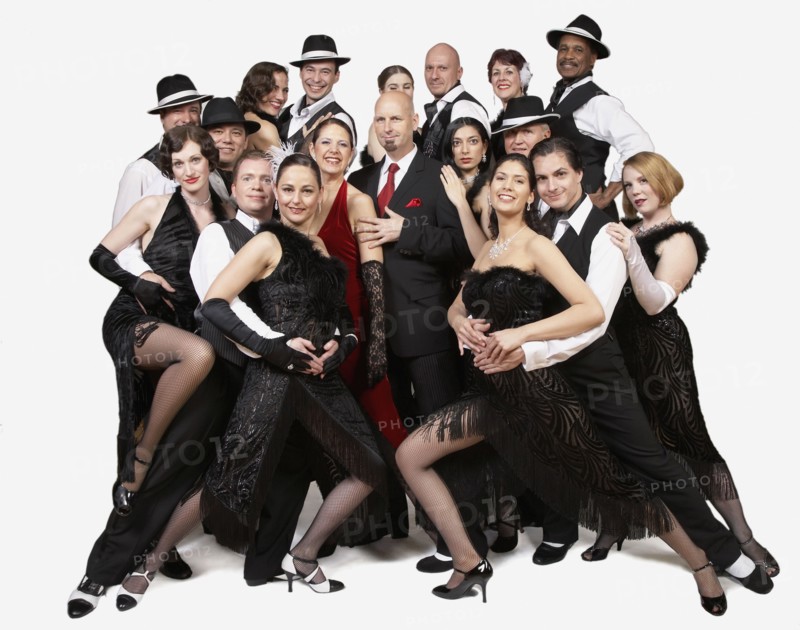 Multi-ethnic people posing in tango outfits