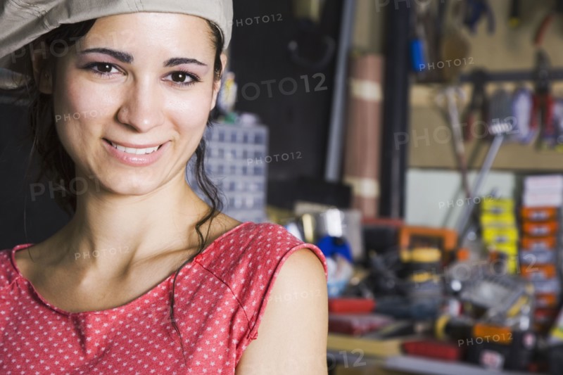 Middle Eastern woman in home workshop
