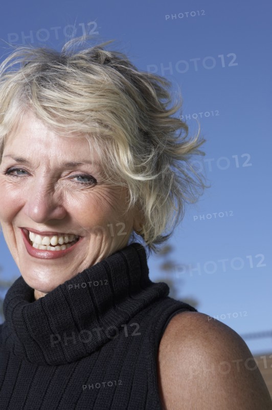 Senior Caucasian woman smiling outdoors