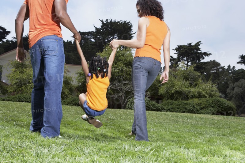 Family playing together in park