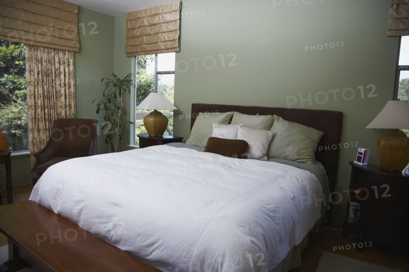 Bed and bench in bedroom