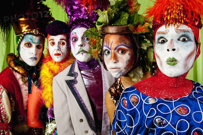 Clowns wearing theatrical makeup