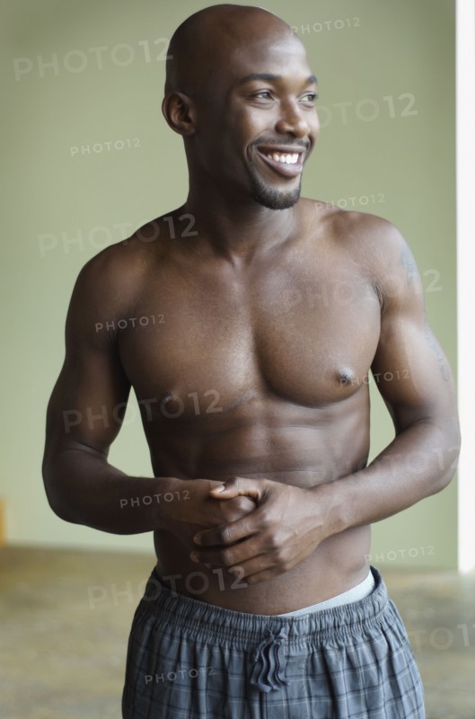 Portrait of bare chested African man