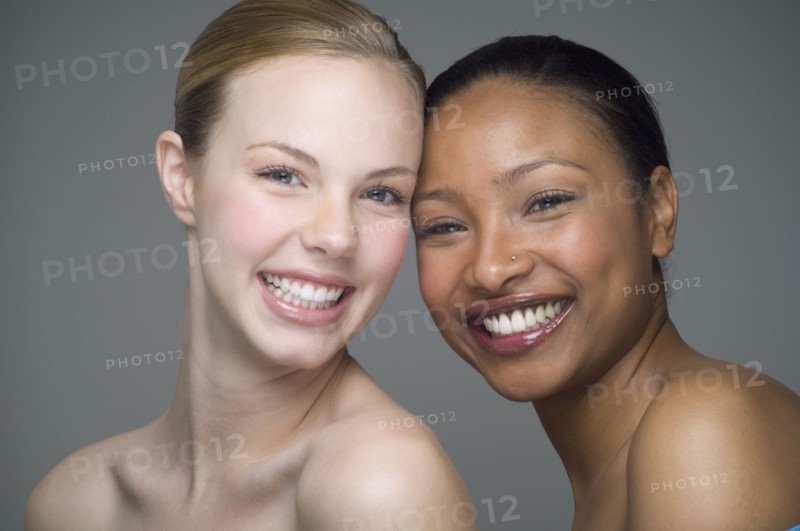 Multi-ethnic women with bare shoulders