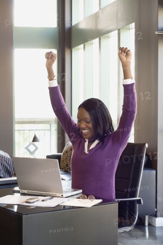 African businesswoman cheering