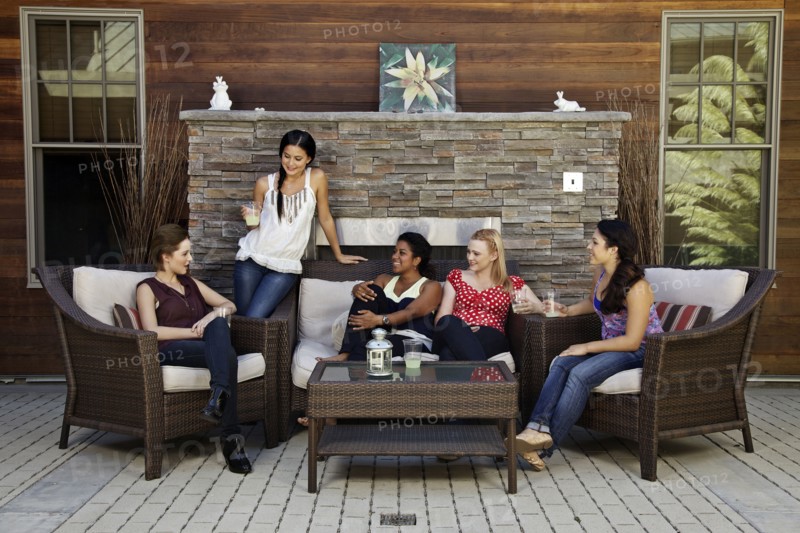 Women hanging out on patio living room