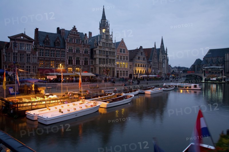Quaint town and boats moored on canal