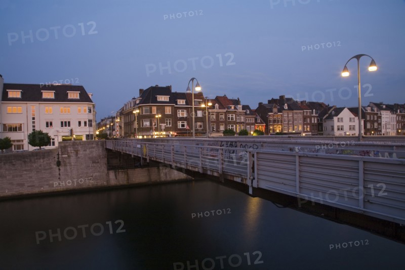 Dutch canal and bridge at night