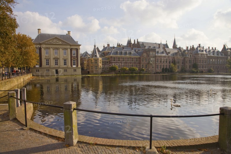 Ornate Dutch buildings near pond