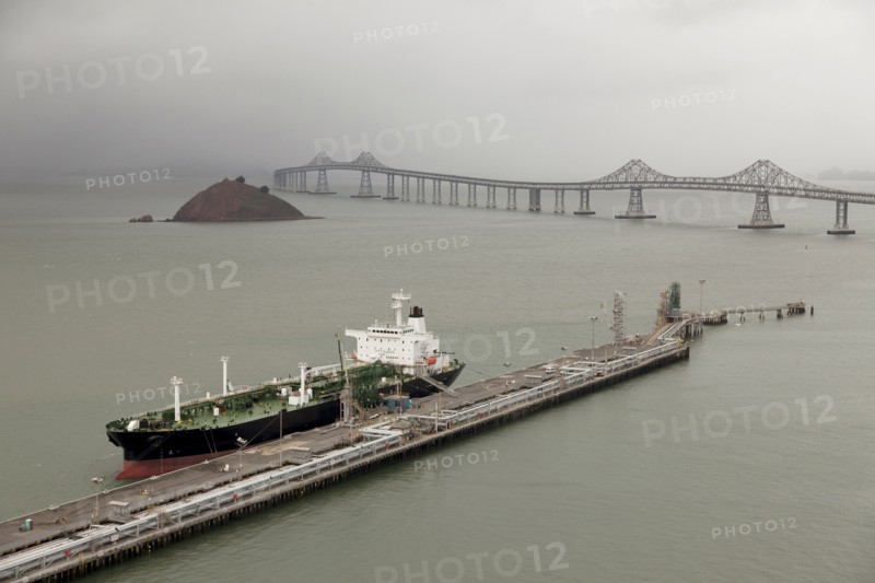 Oil tanker offloading in urban dock