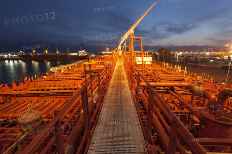 High angle view of deck piping on oil tanker ship
