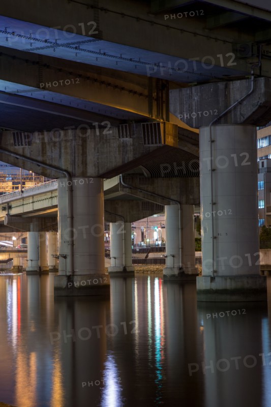 Highway overpass pillars in urban river