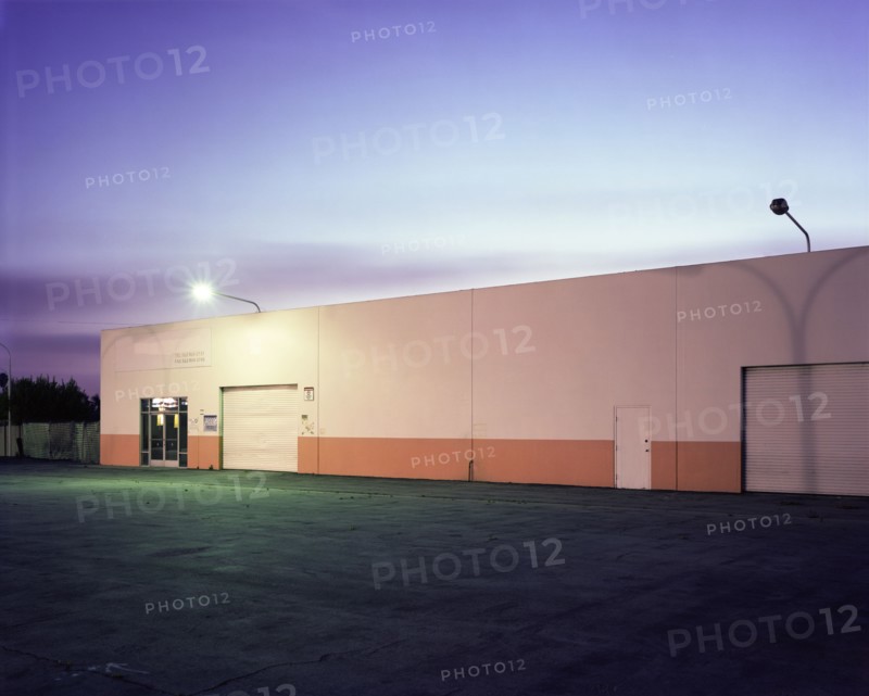 Floodlights over industrial garage doors