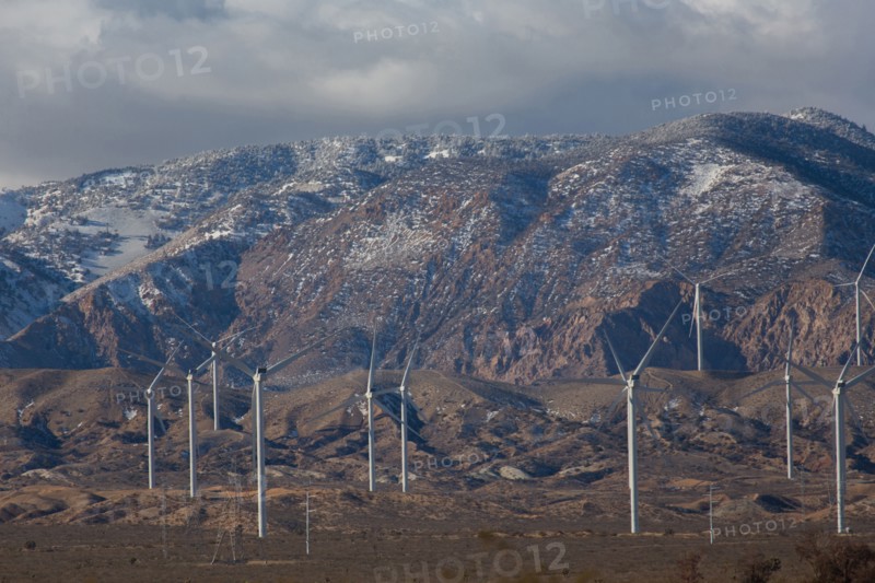 Wind turbines near mountain