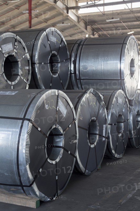 Metal rolls in warehouse