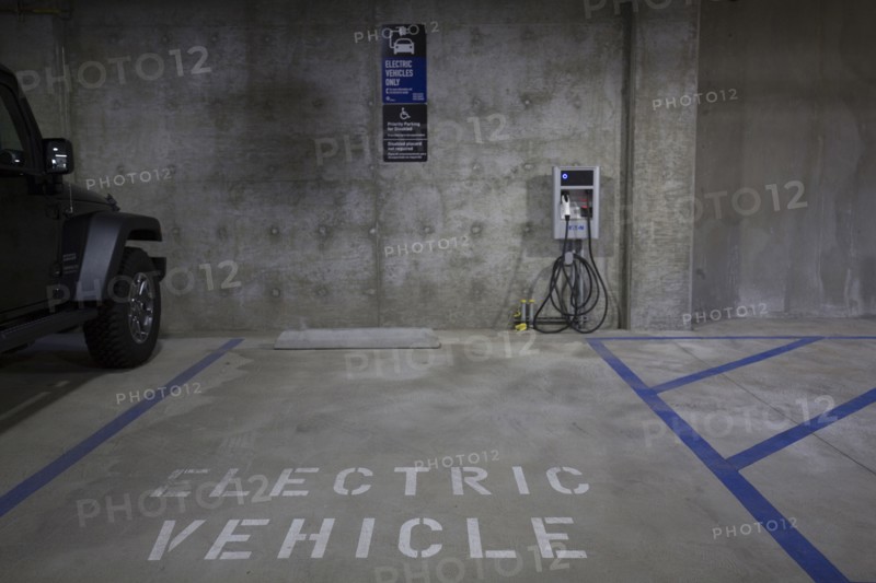 Electric vehicle parking space and charging station