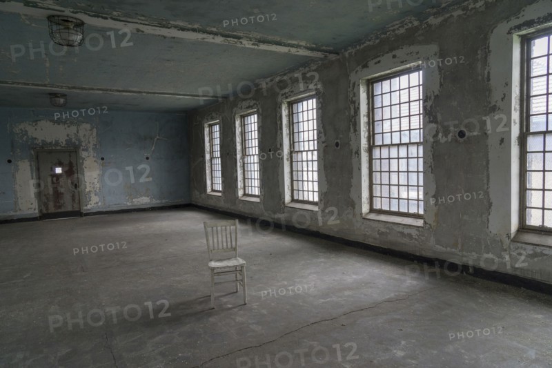 Chair in empty warehouse