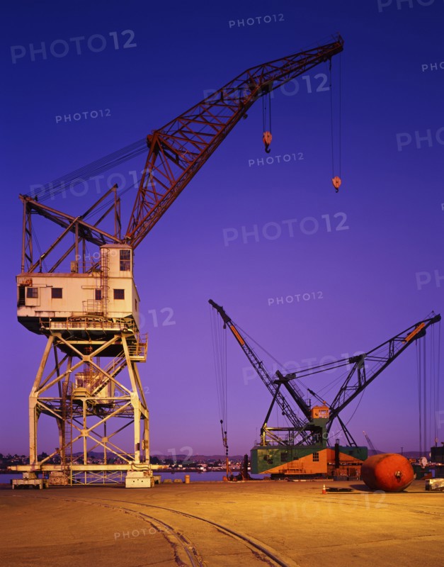 Cranes at harbor at night