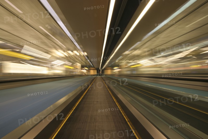 Blurred motion of moving walkway